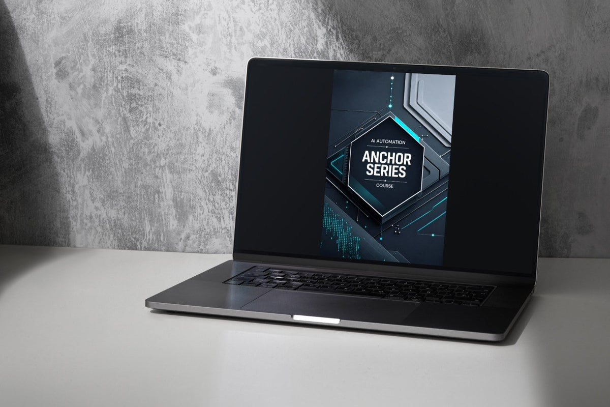 A dark gray laptop sits open on a white tabletop against a textured gray wall, with the screen displaying a course cover that reads 'NEXUS MODULE'.